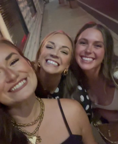 Tahlia and friends taking a selfie on a night out