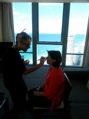 Photo sent in with this review: A make-up artist doing one of the girls' make-up beside a high-rise hotel window over the ocean