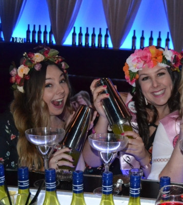 Photo sent in with this review: Two friends in flower crowns at a cocktail class, one shaking a cocktail