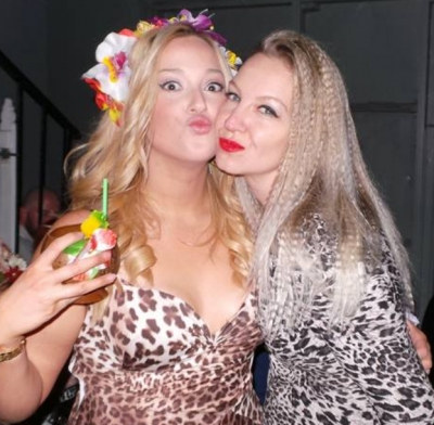 Photo sent in with this review: Two friends cheek to cheek in leopard print, one in a flower crown holding a cocktail