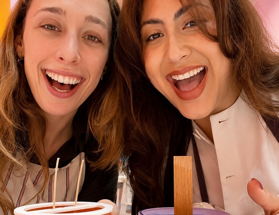 Two friends laughing together on a girls weekend in Sydney